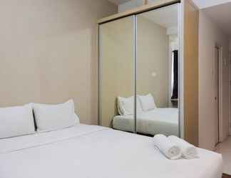 Bedroom 2 Studio Best Price Apartment at Tamansari Skylounge By Travelio