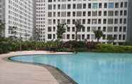 Swimming Pool 4 Studio Fully Furnished Apartment at Serpong Midtown Residence By Travelio
