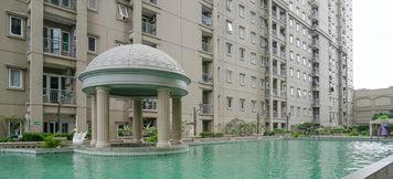 Swimming Pool 3 3BR Comfy Spacious at Grand Palace Kemayoran Apartment By Travelio