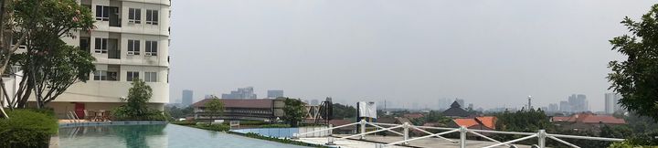 Swimming Pool 2 2BR Luxurious and Comfy Cinere Bellevue Suites Apartment By Travelio