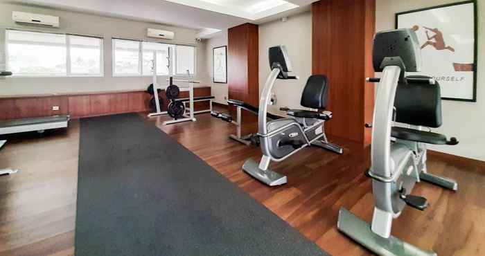 Fitness Center 2BR Tranquil Apartment at Bintaro Park View By Travelio