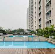 Swimming Pool 2 2BR Tranquil Apartment at Bintaro Park View By Travelio