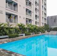 Swimming Pool 3 2BR Tranquil Apartment at Bintaro Park View By Travelio