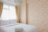 Bedroom 2BR Tranquil Apartment at Bintaro Park View By Travelio