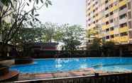 Swimming Pool 5 Best Value 2BR Apartment at Sentra Timur By Travelio