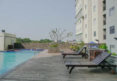 Swimming Pool 4 Strategic 2BR Apartment at Gading Greenhill By Travelio