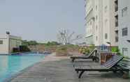 Kolam Renang 4 Strategic 2BR Apartment at Gading Greenhill By Travelio