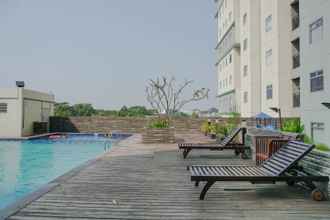 Swimming Pool 4 Strategic 2BR Apartment at Gading Greenhill By Travelio