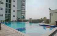 Swimming Pool 3 Strategic 2BR Apartment at Gading Greenhill By Travelio