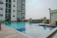 Swimming Pool Strategic 2BR Apartment at Gading Greenhill By Travelio