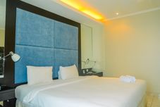Bedroom 3BR at MOI Kelapa Gading Square Apartment By Travelio