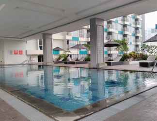 Swimming Pool 2 Studio Fully Furnished Apartment at H Residence By Travelio