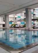 SWIMMING_POOL Studio Fully Furnished Apartment at H Residence By Travelio