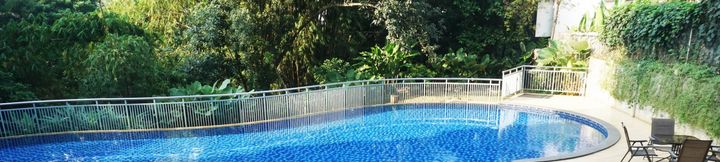Swimming Pool 2 1BR Trendy near ITB @ Dago Suites Apartment By Travelio