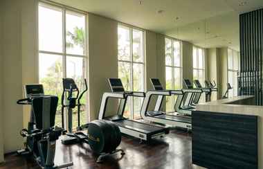 Fitness Center 2 2BR Minimalist and Cozy at Citralake Suites Apartment By Travelio