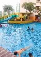 SWIMMING_POOL Elegant 2BR Apartment at Great Western Resort By Travelio