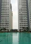 SWIMMING_POOL 2BR Elegant and Convenient at M-Town Residence Apartment By Travelio