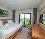 Phòng ngủ 6 Marina Bay Con Dao Hotel