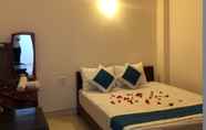 Bedroom 6 Ha Nguyen Hotel Binh Duong