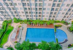 Swimming Pool 2 1BR Minimalist and Simple at Saveria Apartment By Travelio
