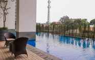 Swimming Pool 7 Convenient 1BR Bintaro Plaza Apartment By Travelio