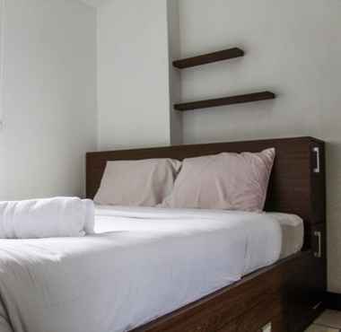 Bedroom 2 2BR Comfortable and Tranquil Apartment at Green Pramuka By Travelio