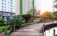 Bangunan 3 2BR Tranquil Green Pramuka Apartment near Shopping Center By Travelio