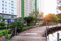 Exterior 2BR Tranquil Green Pramuka Apartment near Shopping Center By Travelio