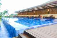Swimming Pool Studio Luxury at Azalea Suites Apartment By Travelio