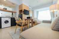 ห้องนอน Studio Modern and Spacious Grand Kamala Lagoon Apartment By Travelio