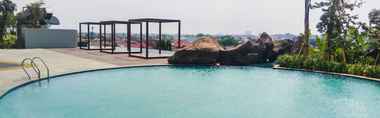 Swimming Pool 2 Studio Modern and Spacious Grand Kamala Lagoon Apartment By Travelio