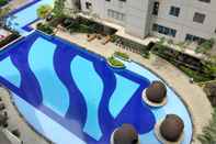 Lobi 1BR Minimalist with Pool View at Bassura City Apartment By Travelio