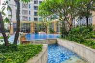 Swimming Pool Modern and Comfortable 1BR at Casa Grande By Travelio