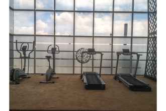 Fitness Center 4 Posh 1BR The Oasis Cikarang Apartment By Travelio