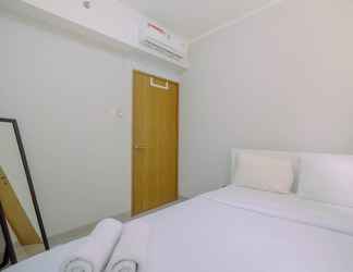 Kamar Tidur 2 Posh 1BR The Oasis Cikarang Apartment By Travelio