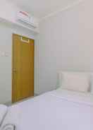 BEDROOM Posh 1BR The Oasis Cikarang Apartment By Travelio