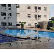 Exterior 3 1BR at Green Pramuka Apartment near Mall By Travelio