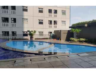 Exterior 2 1BR at Green Pramuka Apartment near Mall By Travelio