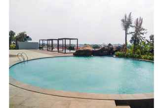 Swimming Pool 4 Comfy Studio Grand Kamala Lagoon Apartment By Travelio