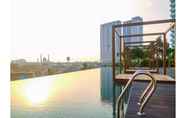 Kolam Renang 3 Comfy Studio Grand Kamala Lagoon Apartment By Travelio