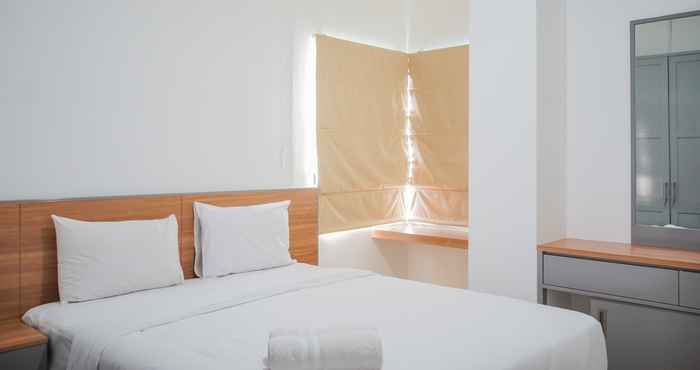 ห้องนอน 2BR Cozy with City View The Nest Apartment By Travelio