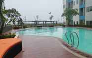 Swimming Pool 3 2BR Cozy with City View The Nest Apartment By Travelio