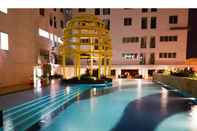 Swimming Pool 2BR Modern and Relax @ Bassura City Apartment By Travelio