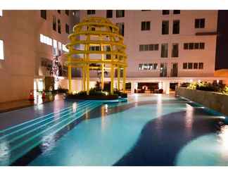 Swimming Pool 2 2BR Modern and Relax @ Bassura City Apartment By Travelio