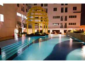 Swimming Pool 2BR Modern and Relax @ Bassura City Apartment By Travelio