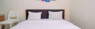 Bedroom 2 Studio Homey Apartment at Bogorienze Resort By Travelio