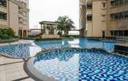 Swimming Pool 7 Comfy and Homey 2BR at Mediterania Marina Ancol By Travelio