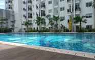 Swimming Pool 4 Comfy and Strategic Studio Signature Park Grande By Travelio