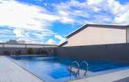 Swimming Pool 2 Studio Modern and Cozy Studio Park View Apartment By Travelio