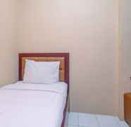 Bedroom 2 2BR Minimalist Apartment at Kalibata City near Shopping Center By Travelio